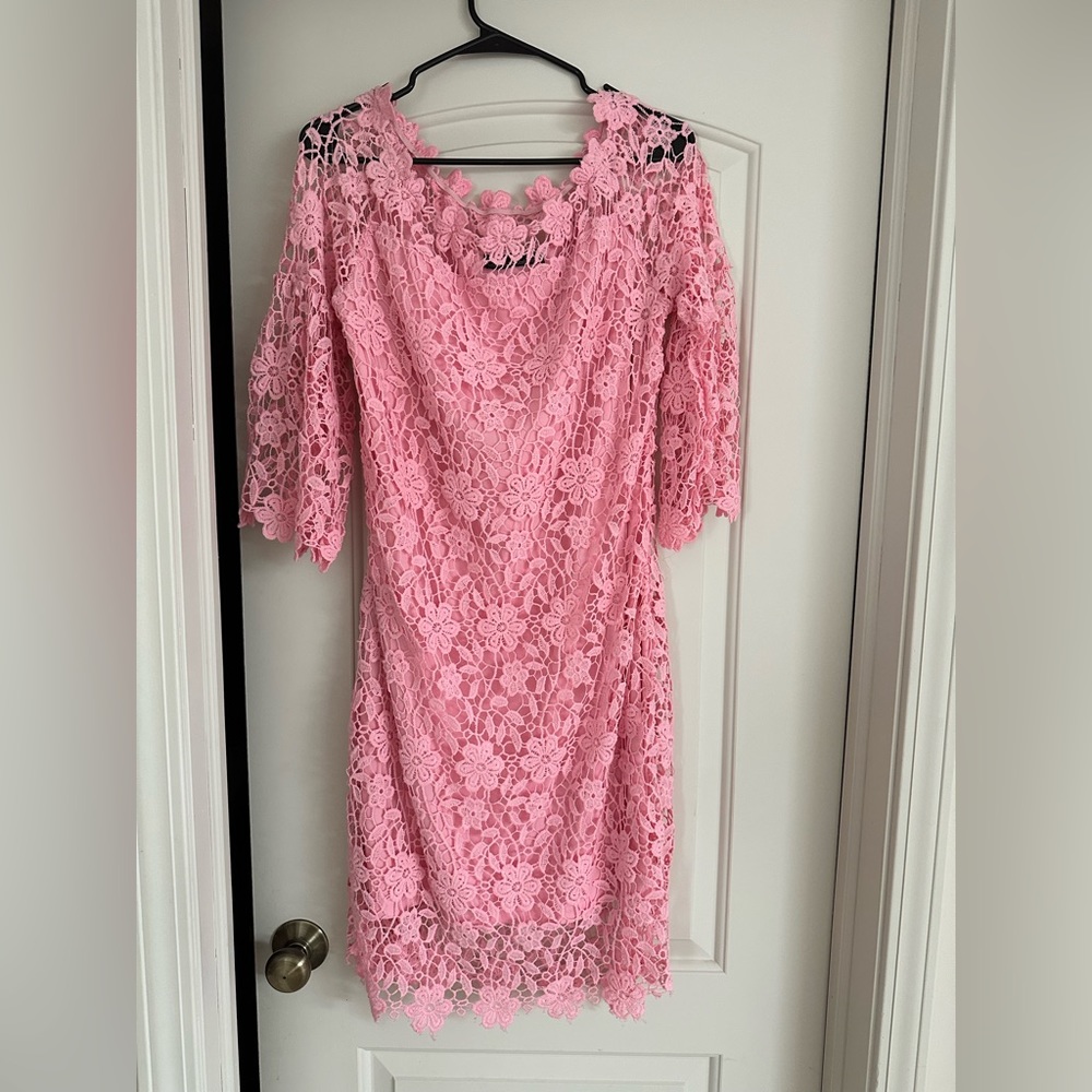 Pink off the shoulder cocktail dress.